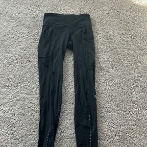 Black Lululemon leggings with pockets, size 4